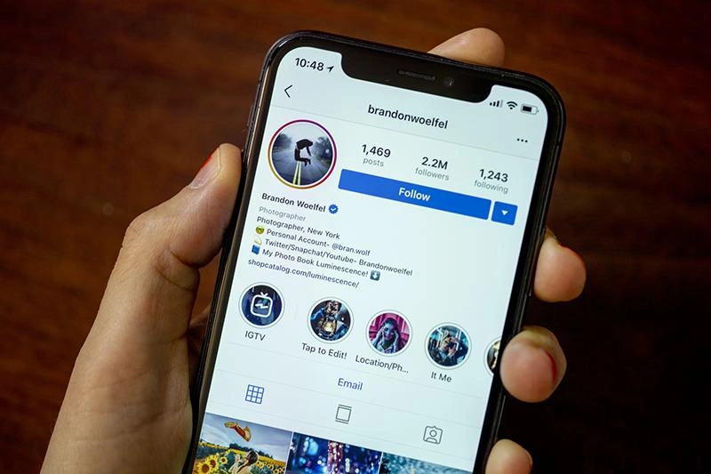Instagram profile featuring multiple Story Highlights organized beneath the bio